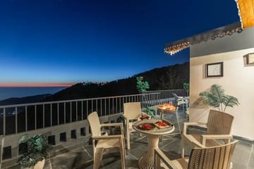 Evara | Serene Pet-friendly 4-BHK Hill Retreat With Balcony, Fireplace & Scenic Views - Image 2