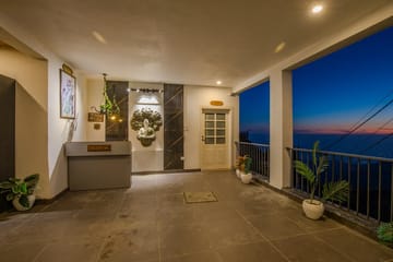 Evara | Serene Pet-friendly 4-BHK Hill Retreat With Balcony, Fireplace & Scenic Views - Image 5