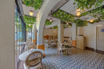 Goan Bliss Junior Suite | Spacious Boutique Suite with Living Room, Private Terrace, Shared Pool, Restro, Spa & Library - Image 4