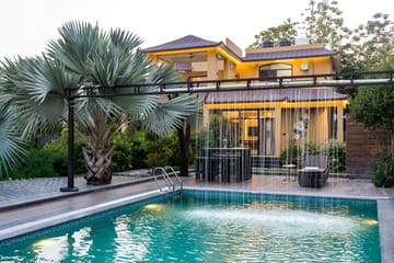 Autum Villa | Pet-friendly 4-BHK Villa with Private pool with rain curtain, Game Zone, Indoor Bar and Garden - Image 2