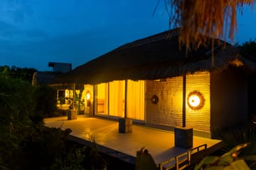 Kimaya Kove | Hut-Style Cottage with Open-Air Shower, Shared Pool, Restaurant, and Garden in Boutique Resort - Image 2
