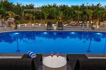 ASK Farms | Refined 4-BHK villa with Theatre Lounge, Pool & Fire BBQ Deck - Image 3