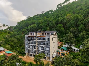 Dochi | 4-BHK apartment with Hill Views, Living Room, & Balconies - Image 2