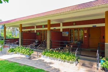 Avocado Cottages Executive Room | Pet-friendly Stay With Private Patio & Common Garden Amid Avocado & Coffee Estate Plantation - Image 2