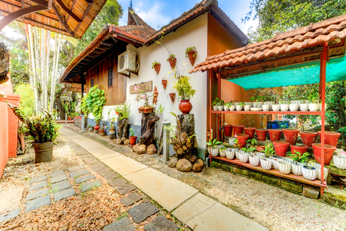 Palm Dale Premium Room | Heritage Riverside Escape with Garden & Restaurant