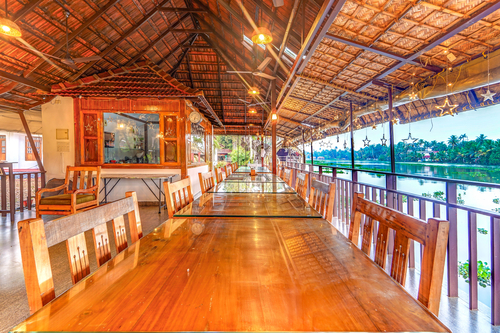 Palm Dale Premium Room | Heritage Riverside Escape with Garden & Restaurant