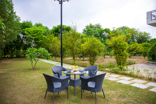 Raha Farms | 2-BHK Pet-friendly Retreat with a Garden, Shared pool, Restaurant, Library, & Game zone