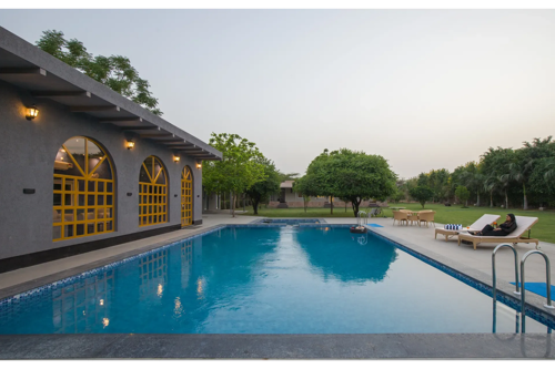 Enchantia | Pet-friendly 6-BHK Retreat With Private Pool, Garden & Party Hall