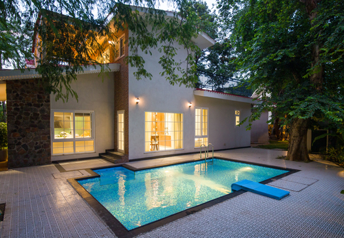 Varsha Greens | A 4-BHK Retreat on 0.8-Acre Land with Private Pool, Lush Garden & Outdoor Patios