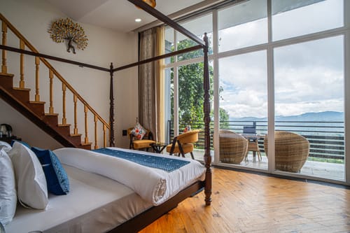 Trio’s Top | Pet-friendly 2-BHK with Attic, Shared Sit-out Area, Stepped Garden & Hill Views