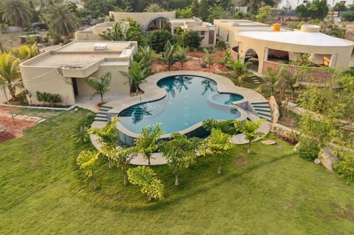 Urvi Terra Luxe Suite | Pet & Eco-friendly Farmstay With Garden, Common Pool & Games Zone – 1 bedroom villa in Bengaluru, Karnataka