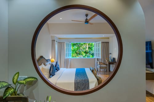 Goan Bliss Junior Suite | Spacious Boutique Suite with Living Room, Private Terrace, Shared Pool, Restro, Spa & Library – 1 bedroom villa in South Goa, Goa