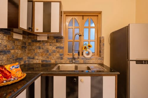 Emperor Ozran | 2-BHK Retreat With Balconies, Restaurant & Bar