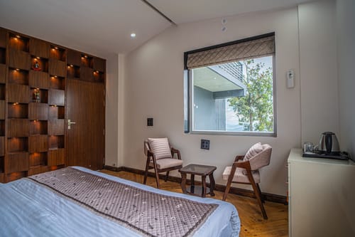 Trio’s Top | Pet-friendly 2-BHK with Attic, Shared Sit-out Area, Stepped Garden & Hill Views