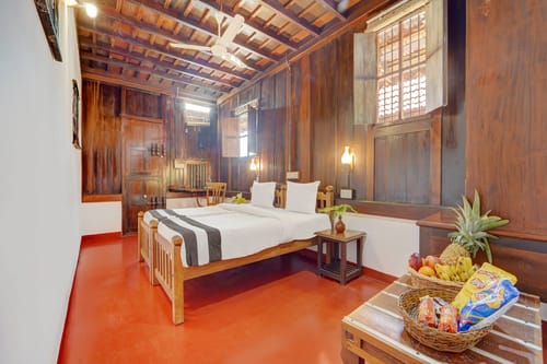 Palm Dale Deluxe Room | Serene Heritage Retreat by the Backwaters with Garden & Restaurant – 1 bedroom villa in Alappuzha, Kerala