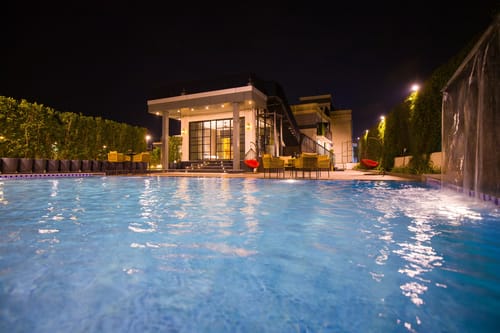 Ibiza | Luxe 4-BHK Farmhouse With Private Pool, Garden & Indoor Bar