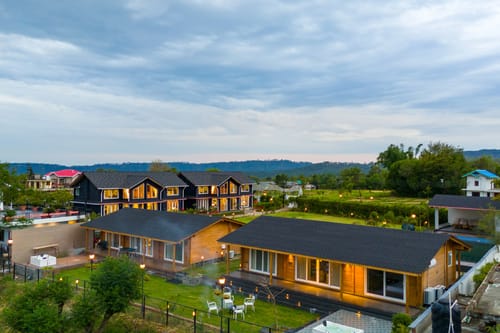 Esh Cottages Moss | Hilltop 2-BHK Retreat with Open-air Jacuzzi, Shared Garden, Pool & Cosy Lounge