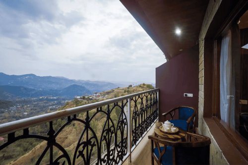 Pine Shadow Fuchsia | Hillside Retreat With Picturesque Balcony & Restaurant – 1 bedroom villa in Shimla, Himachal Pradesh