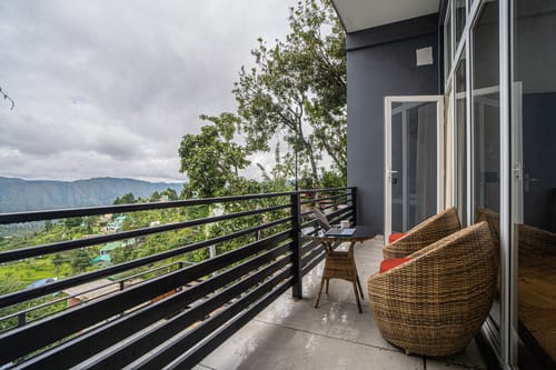 Trio’s Top | Pet-friendly 2-BHK with Attic, Shared Sit-out Area, Stepped Garden & Hill Views