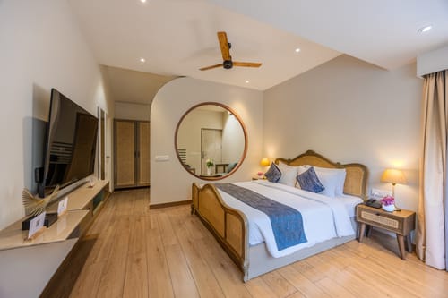 Goan Bliss Junior Suite | Spacious Boutique Suite with Living Room, Private Terrace, Shared Pool, Restro, Spa & Library – 1 bedroom villa in South Goa, Goa