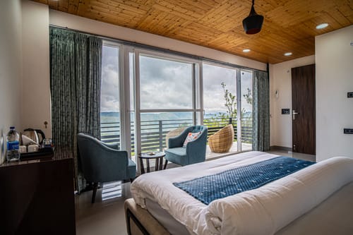 Trio’s Top | Hilltop Pet-friendly 2-BHK with Shared Sit-out Area, Stepped Garden & Hill Views