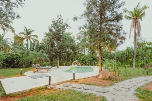Ananta Bliss Talam | 2-BHK Pet-friendly Villa & 1 Tent On 1-Acre of Land with Shared Pool, Firepit, Garden & Gazebo