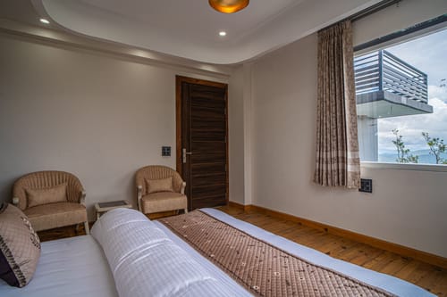 Trio’s Top | Hilltop Pet-friendly 2-BHK with Shared Sit-out Area, Stepped Garden & Hill Views