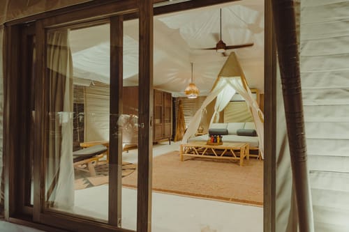 Ananta Bliss Talam | 2-BHK Pet-friendly Villa & 1 Tent On 1-Acre of Land with Shared Pool, Firepit, Garden & Gazebo