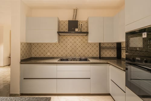 Kensho Daisy | Serene 5-BHK Villa With Private Pool, Common Pool, & Lift; Near Popular Beaches