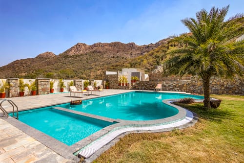 Mandovar Mountain Valley Retreat | 4 Room Pet-friendly Suite In a Private Estate with Shared Pool, Garden, Restaurant & Hill Views – 4 bedroom villa in Udaipur, Rajasthan