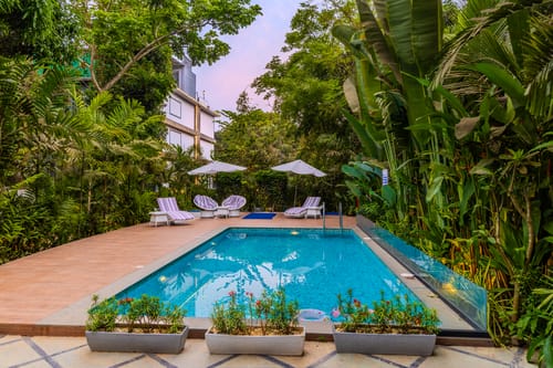 Goan Bliss Junior Suite | Spacious Boutique Suite with Living Room, Private Terrace, Shared Pool, Restro, Spa & Library – 1 bedroom villa in South Goa, Goa