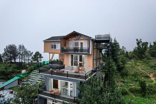 Trio’s Top | Hilltop Pet-friendly 2-BHK with Shared Sit-out Area, Stepped Garden & Hill Views