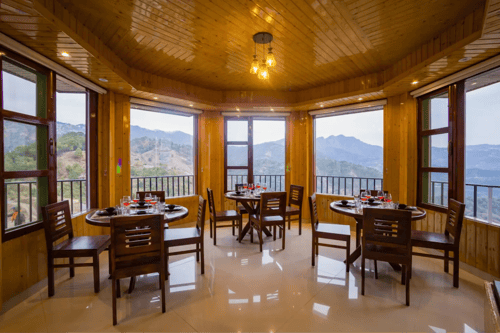 Pine Shadow Fuchsia | Hillside Retreat With Picturesque Balcony & Restaurant – 1 bedroom villa in Shimla, Himachal Pradesh
