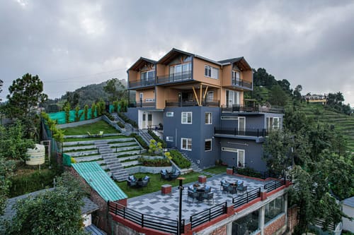 Trio’s Top | Hilltop Pet-friendly 2-BHK with Shared Sit-out Area, Stepped Garden & Hill Views