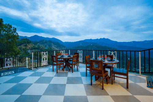 Pine Shadow Fuchsia | Hillside Retreat With Picturesque Balcony & Restaurant – 1 bedroom villa in Shimla, Himachal Pradesh