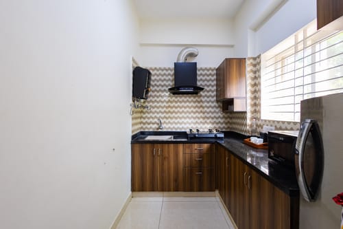 SLV Ventures Abhignya | 2-BHK Urban Stay With Private Balcony & Green View With Lift – 2 bedroom villa in Bengaluru, Karnataka