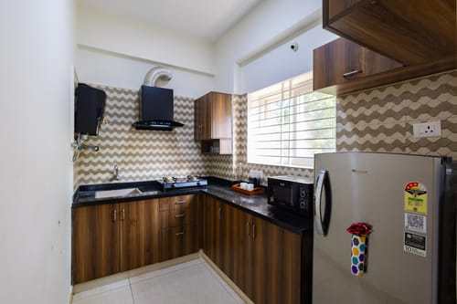 SLV Ventures Abhignya | 2-BHK Urban Stay With Private Balcony & Green View With Lift – 2 bedroom villa in Bengaluru, Karnataka
