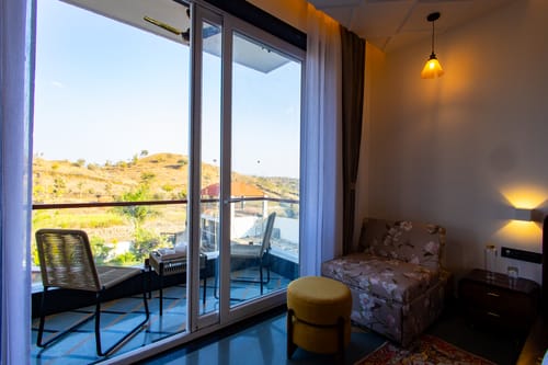 Godan Terra Estate | 10-BHK Riverside Retreat with Pool, Garden, Elevated Gazebo in Nature & Mountain Views – 10 bedroom villa in Udaipur, Rajasthan