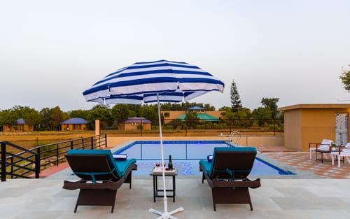 Dhela Jungle Retreat Cobblestone | Pet- Friendly Duplex 2-BHK in a Mini Resort with Shared Pool Near Jhirna Safari Zone – 2 bedroom villa in Ramnagar, Uttarakhand