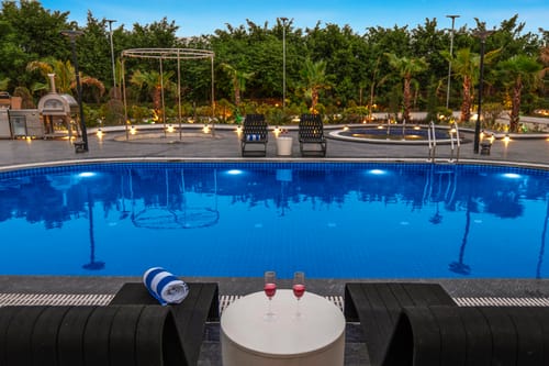 ASK Farms | Refined 4-BHK villa with Theatre Lounge, Pool & Fire BBQ Deck  – 4 bedroom villa in Delhi NCR, Delhi