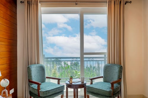 Konifer Wild Fern | Hilltop 2-BHK Retreat with Scenic Views, Shared Garden & Outdoor Seating Space