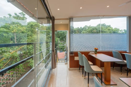 Emperor Ozran | 2-BHK Retreat With Balconies, Restaurant & Bar