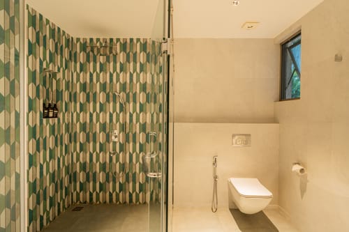 Kensho Daisy | Serene 5-BHK Villa With Private Pool, Common Pool, & Lift; Near Popular Beaches