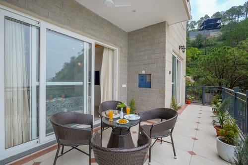 Konifer Wild Fern | Hilltop 2-BHK Retreat with Scenic Views, Shared Garden & Outdoor Seating Space