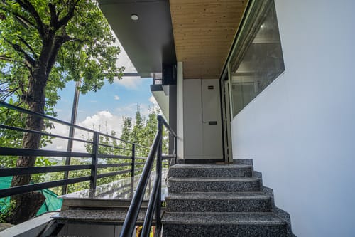 Trio’s Top | Hilltop Pet-friendly 2-BHK with Shared Sit-out Area, Stepped Garden & Hill Views