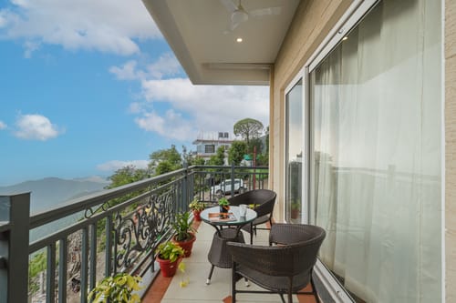 Konifer Wild Fern | Hilltop 2-BHK Retreat with Scenic Views, Shared Garden & Outdoor Seating Space