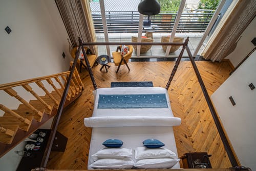 Trio’s Top | Pet-friendly 2-BHK with Attic, Shared Sit-out Area, Stepped Garden & Hill Views