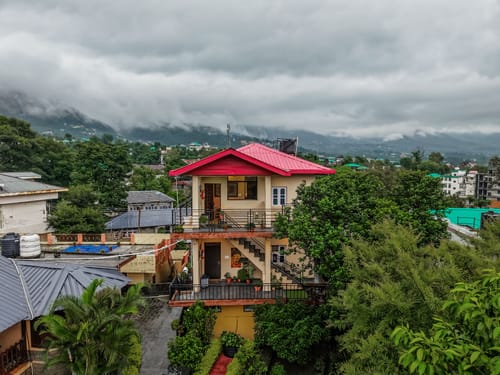 Riva Dreams | 2-BHK Retreat with Hill Views & Lush Garden