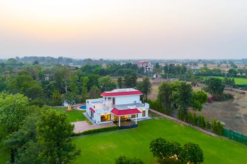 Sanisa Farm |  3-BHK Farmhouse With Private Pool, Game Zone & Lush Garden