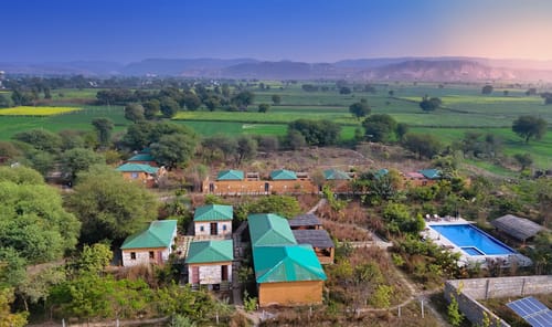 Bagh Serai | Cottage With Plunge Pool & Living Area on 5-Acre Land Near Forest With Common Pool & Restro